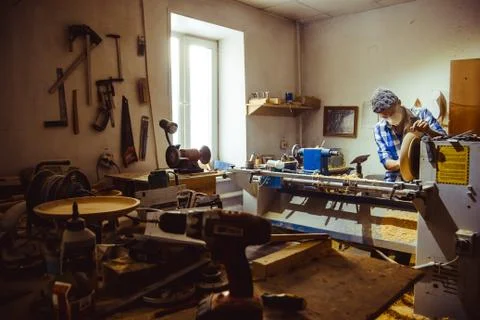 Master in a wood workshop Stock Photos