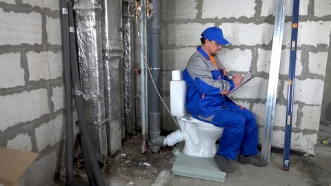 Master, worker checks the water meter in the apartment Stock Footage 115418209