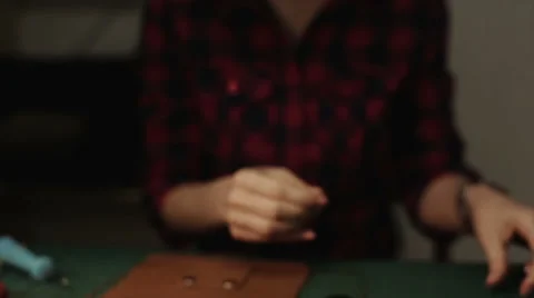 Master working with leather thread a needle in Stock Footage 54424653