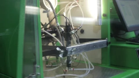 The master works with complex hydraulic equipment Stock Footage 145660869