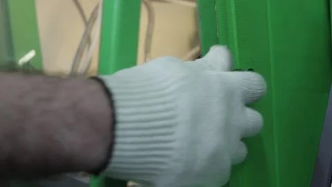 The master works with complex hydraulic equipment Stock Footage 145660874