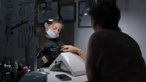 Master works with nails, medium shot Stock Footage 224446340