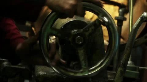 Master works on an old lathe Stock Footage 11287382
