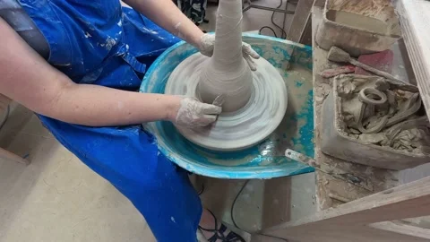 Master works on potter's wheel Stock Footage 195983313