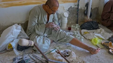 Master works with the stone in the old way Stock Footage 164034852