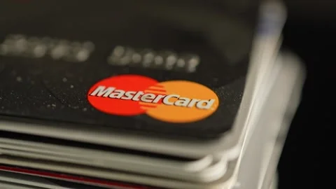 Mastercard credit card symbol on the table. Pile of Visa and Mastercard car.. Stock-Footage 254808047