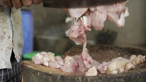 Masterful Chicken Chopper - A Demonstration of Expert Knife Skills Stock Footage 320946598