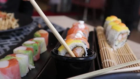 Masterful Sushi with Soy Sauce Stock Footage 284458614