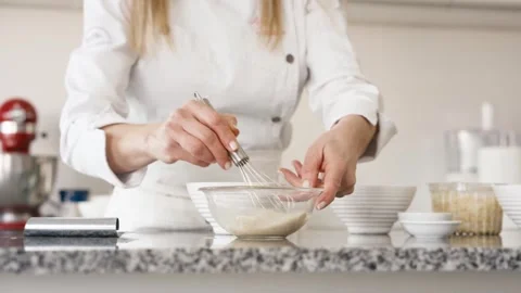 Masterful whisking of the yeast mix 動画素材 246947626