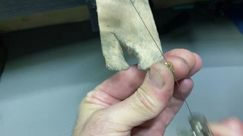 Mastering the art of sewing with focused hand technique Stock Footage 320827625