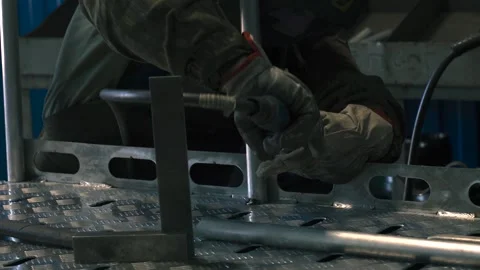 Mastering the art of welding in a dynamic metal workshop environment Stock Footage 308851798