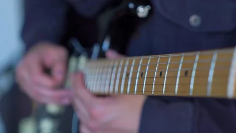 Mastering guitar techniques for beginners with clear step by step instruction Stock Footage 311126546