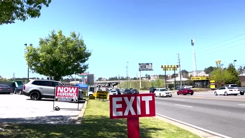 Masters 2022 Traffic and How Hiring at restaurants on Washington Road Stock Footage 174871401