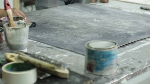 Masters in the art studio process the wood with paint and putty, achieve the Stock Footage 96278498