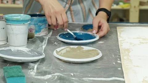 Masters in the art studio process the wood with paint and putty, achieve the Stock Footage 96329561