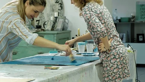 Masters in the art studio process the wood with paint and putty, achieve the Video stock 96330290