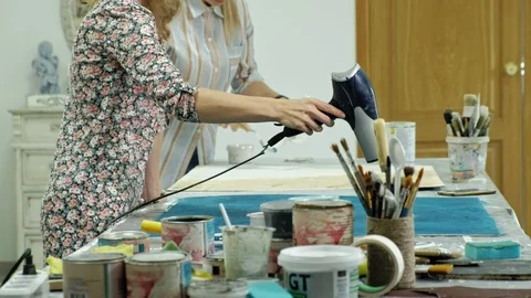 Masters in the art studio process the wood with paint and putty, achieve the Video stock 96330881