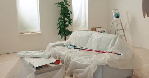 Masters will make repairs in bright room. In the middle of the room there is 스톡 동영상 218333493