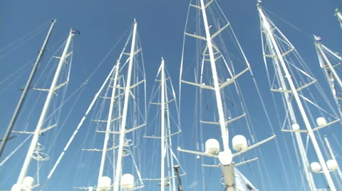 Masts of sailing boats docked  Stock Footage 43320404