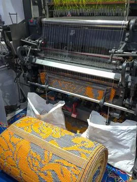 Mat weaving machine. Stock Photos