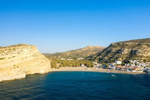 Matala beach and limestone cliffs, Crete coast Stock Photos