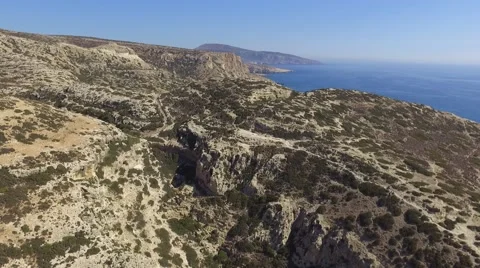Matala Beach Mountain View Drone Shot - 2.7K Stock Footage 65491280