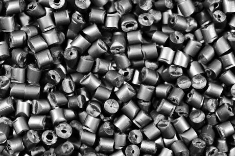 Matallic gray polymer granulate Stock Photos