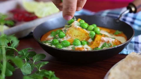Matar Paneer curry recipe made using cottage cheese Stock Footage 146525596