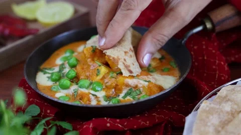 Matar Paneer curry recipe made using cottage cheese Stock Footage 146525772