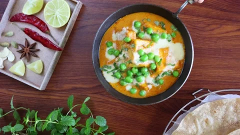 Matar Paneer curry recipe made using cottage cheese Stock Footage 146525778