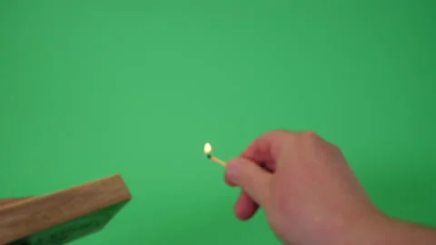 Match being struck on Green screen Chromakey pt 1 of 3 Stock Footage 194882076