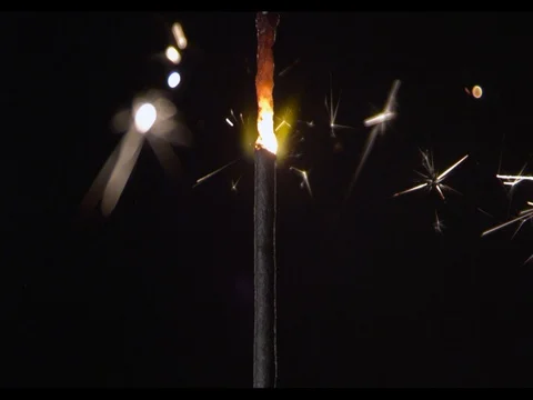 Match burning on a black background, macroshot, camera moving along, slow motion Stock Footage 74302750
