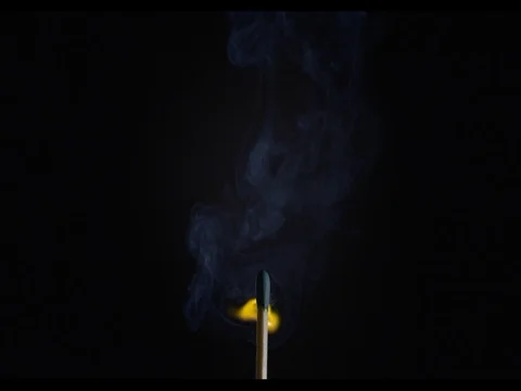 Match burning, bottom part of a macroshot, slow motion Stock Footage 74326589
