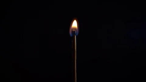 Match burning in the dark Stock Footage 117861747