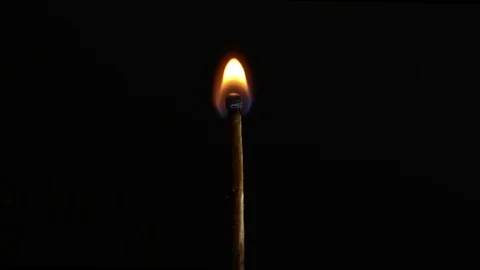 Match burning in the dark Stock Footage 117864627