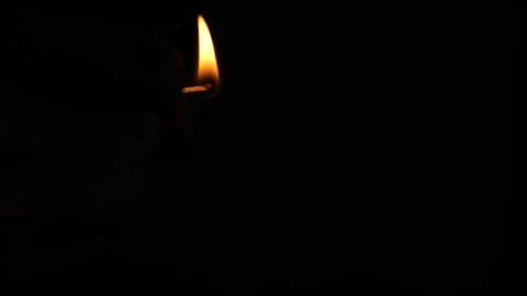 Match flame in the dark Stock Footage 243808275