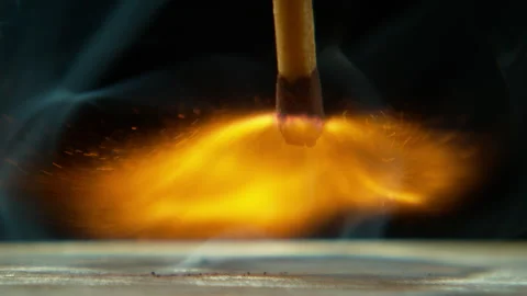Match, flame strike and hand with matchbox stroke with sparks, fire and closeup Stock Footage 243314210