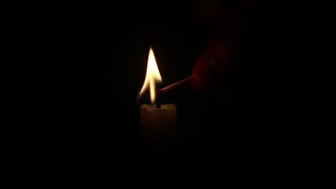 Match In Hand Sets Fire To The Candle of memory Stock Footage 150666287