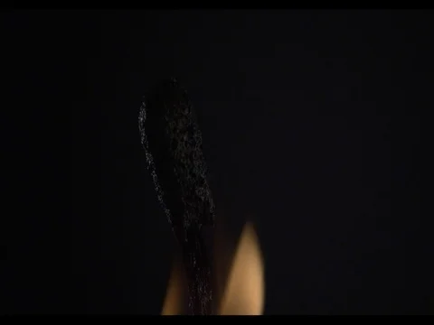 Match head lights up and burning, macroshot, slow motion, The fire fades away Stock Footage 74335812