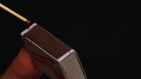 Match ignition on a dark background Stock Footage 106505398