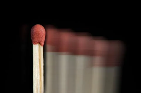 Match isolated on black background in motion. Stock Photos