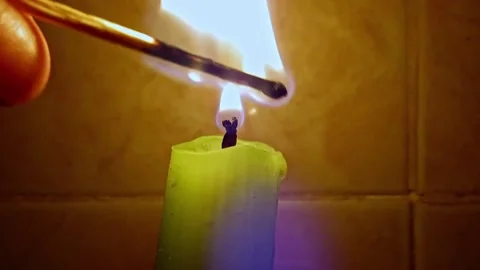 Match Lighting Close-up Macro With Single Candle Flame Isolated on Black Back Video stock 139795419