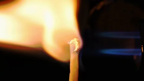 Match lighting with jet flame lighter. Slow Motion Stock Footage 108397987