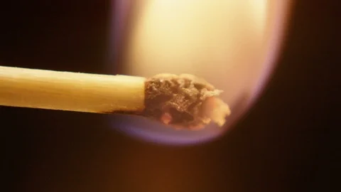 Match lighting up in slow motion Stock Footage