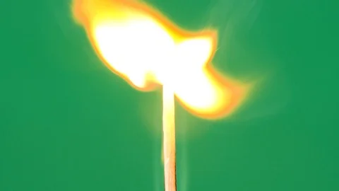 Match lights up on the background of chromakey Stock Footage 105917646