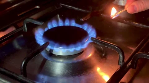A match lights the gas Stock-Footage 311236184