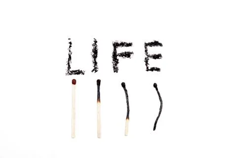 A match lying on a white background Stock Photos