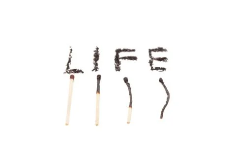 A match lying on a white background Stock Photos