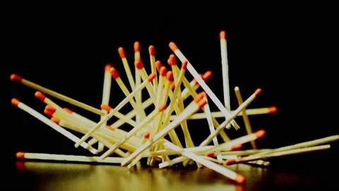 Match sticks falling a black table Stock Footage 158909787