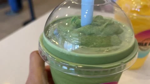 Matcha and Mango Smoothie Asian Drink 스톡 동영상 325337658